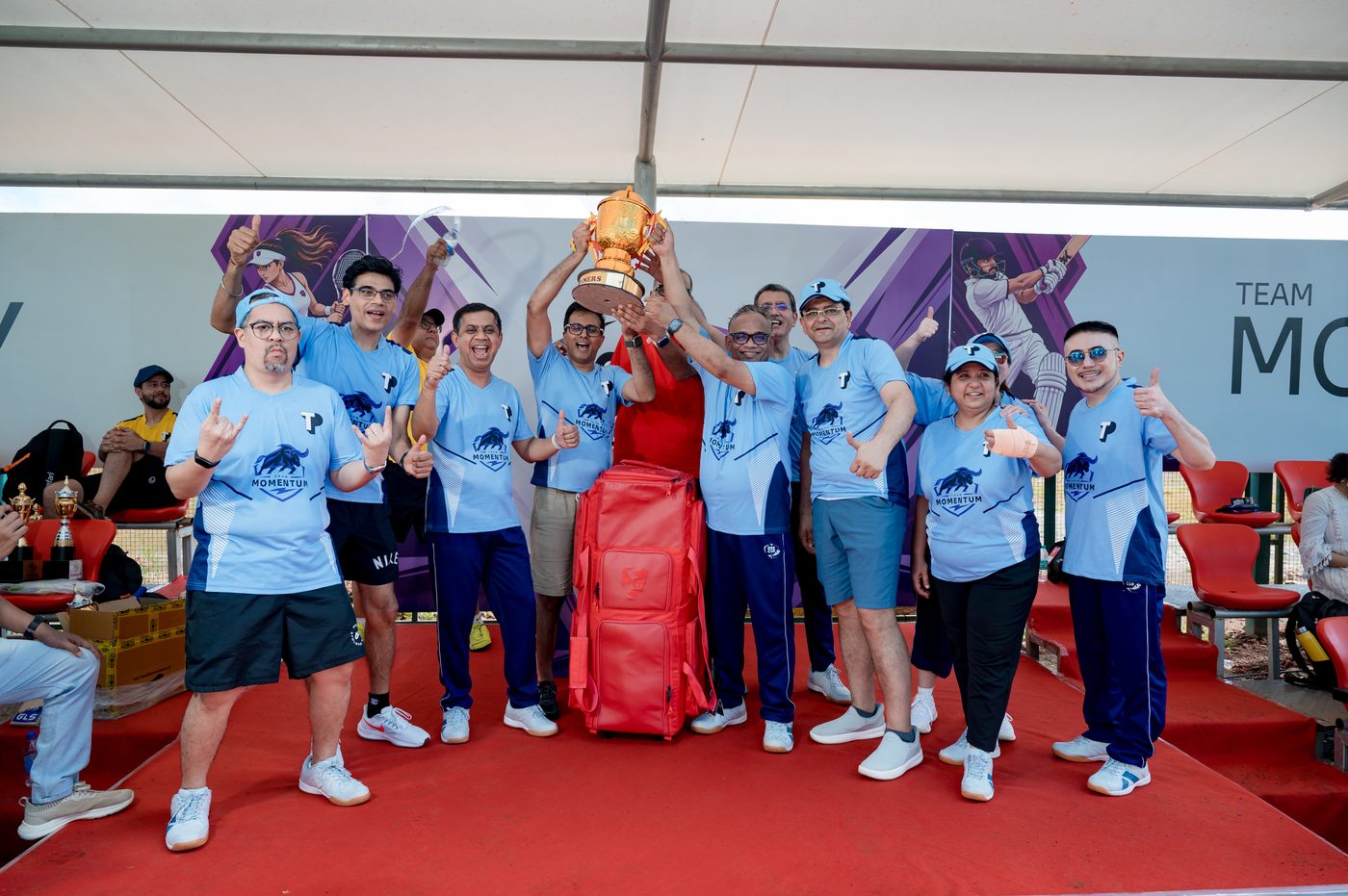 Team Momentum lifts the trophy — Goa
